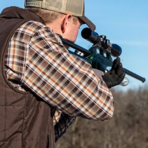 Rancher Shooting the Clear Dart DR1 Dart Gun