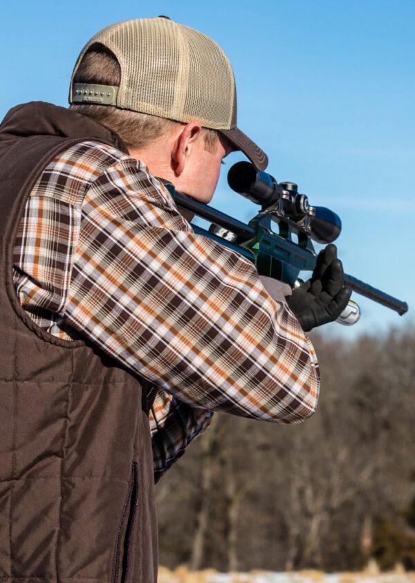 Rancher Shooting the Clear Dart DR1 Dart Gun